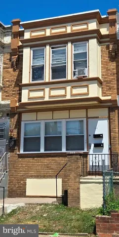 a front view of residential houses with street