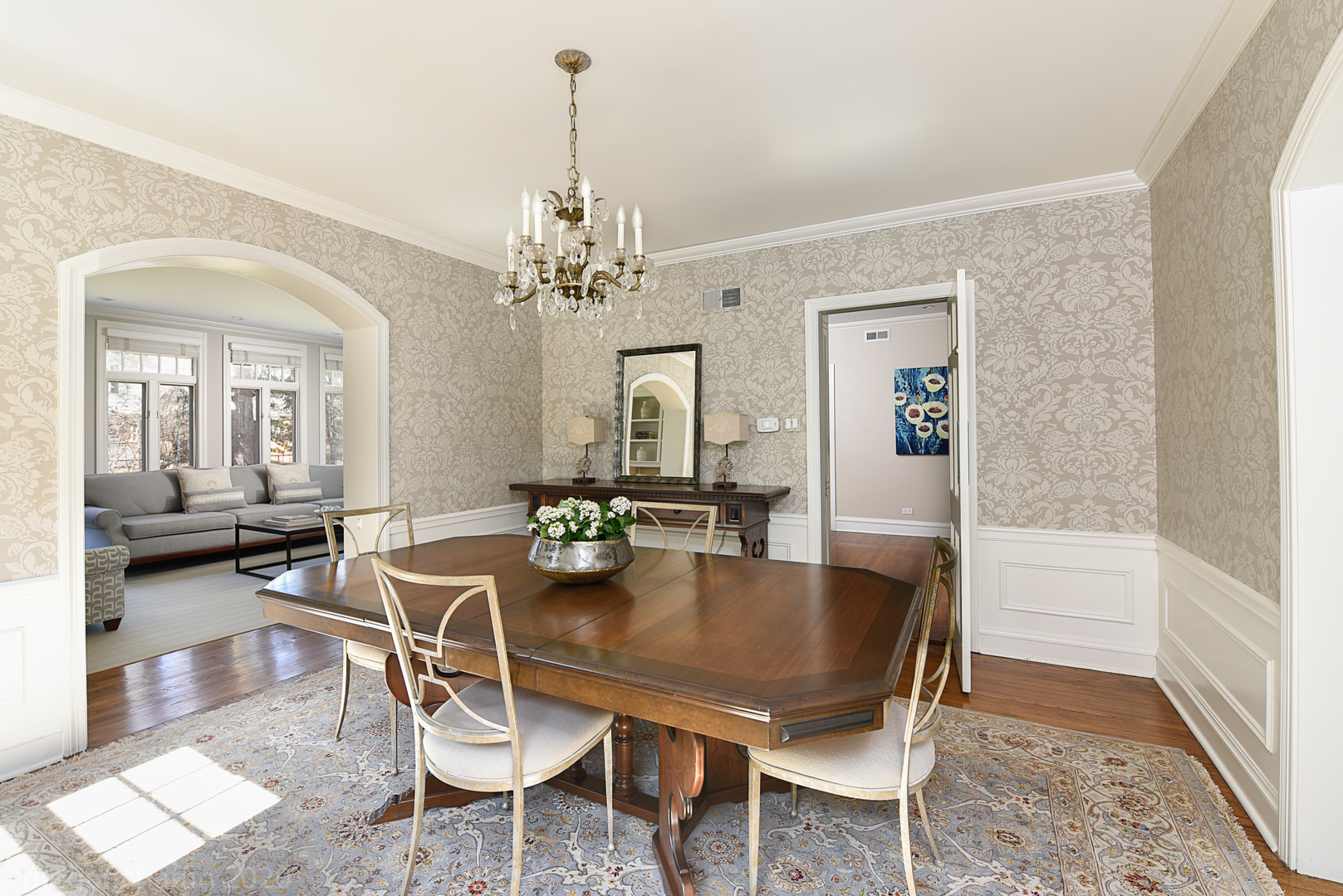 1047 Pawnee Road Wilmette, IL 60091 - Photo 22 of 48 a view of a dining room with furniture and wooden floor