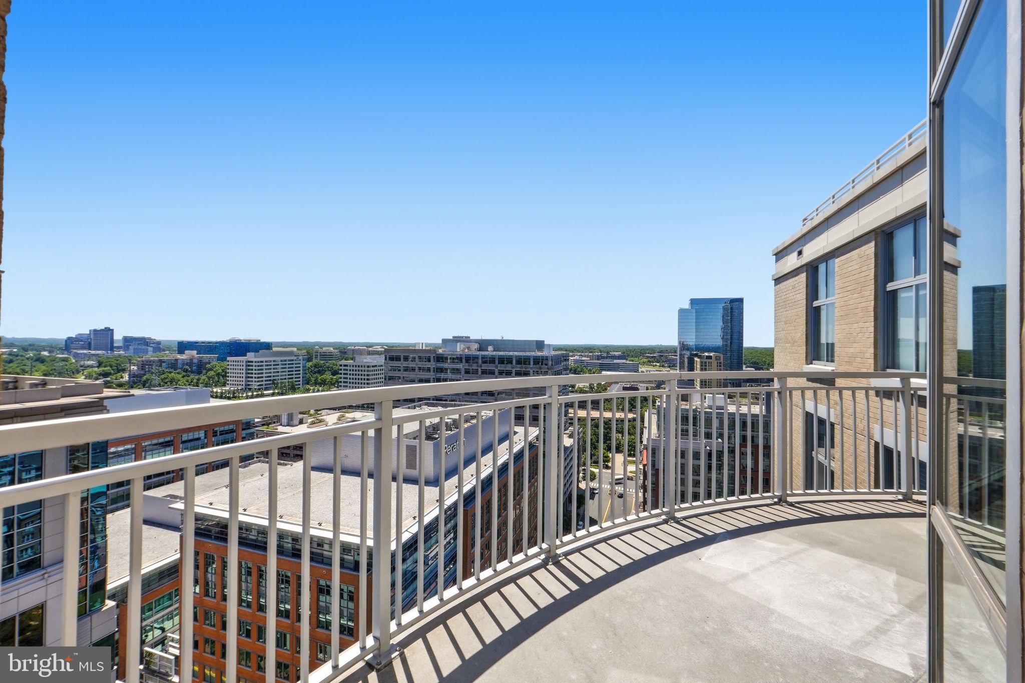 11990 Market Street, Unit 2103 Reston, VA 20190 - Photo 33 of 78 Sky-high balcony with stunning views.
