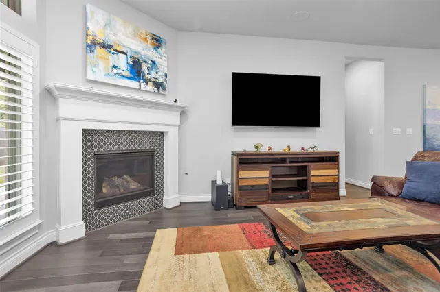 a bed room with a bed and a chair