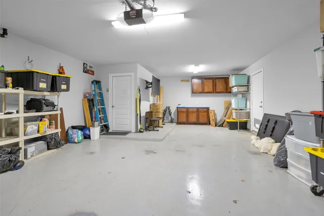 a view of a house with backyard porch and garden