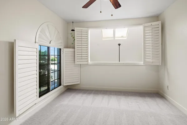 an empty room with window
