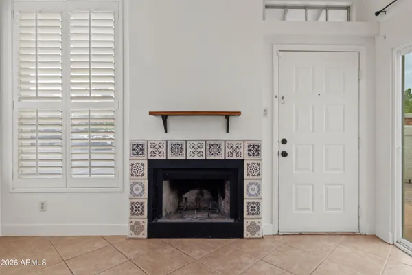 a living room with a fireplace