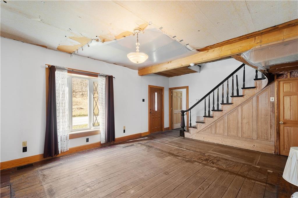 69 Pike Run Road Daisytown, PA 15427 - Photo 20 of 39 a view of an entryway with wooden floor and stairs