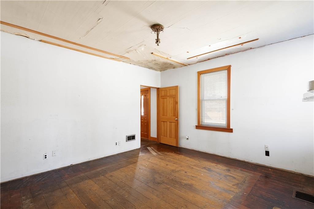 69 Pike Run Road Daisytown, PA 15427 - Photo 23 of 39 a view of an empty room with a window