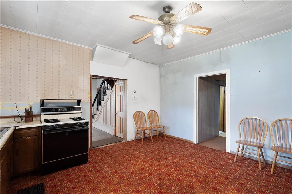 69 Pike Run Road Daisytown, PA 15427 - Photo 28 of 39 a bedroom with a bed and a chair