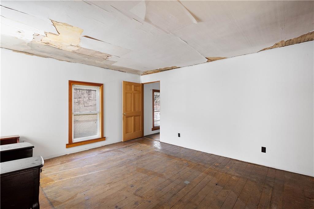 69 Pike Run Road Daisytown, PA 15427 - Photo 36 of 39 a view of an empty room with a window