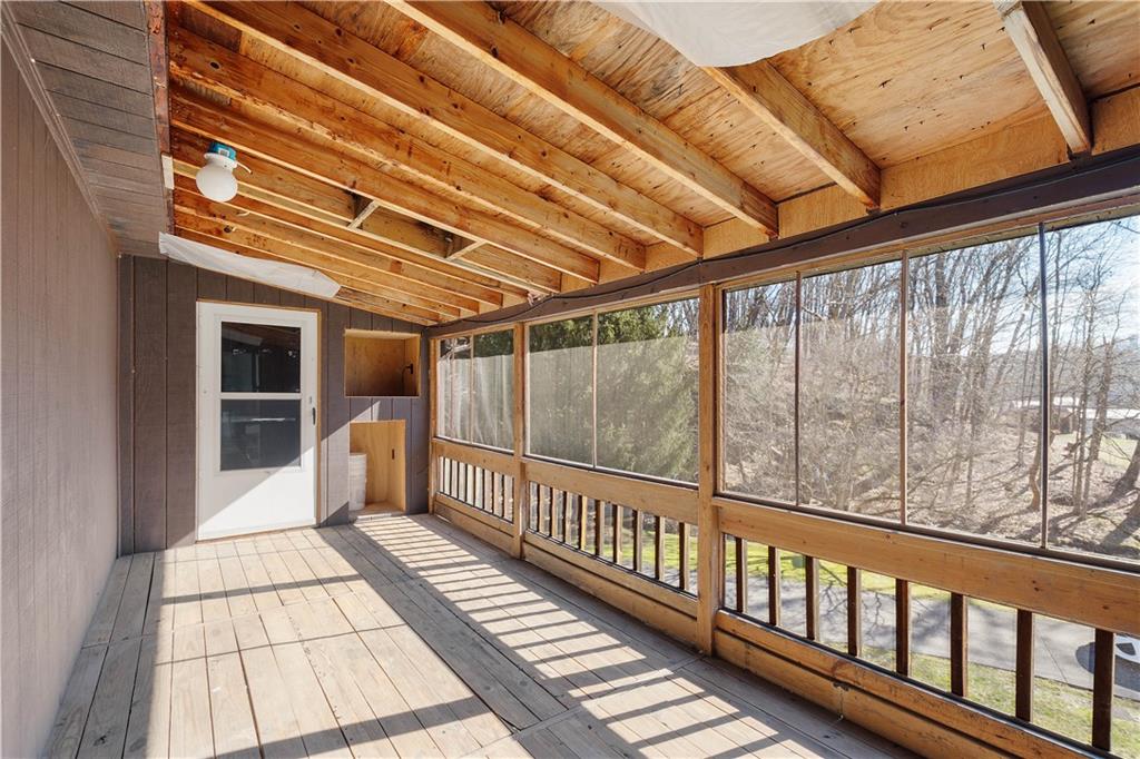 69 Pike Run Road Daisytown, PA 15427 - Photo 39 of 39 a view of a balcony with wooden floor