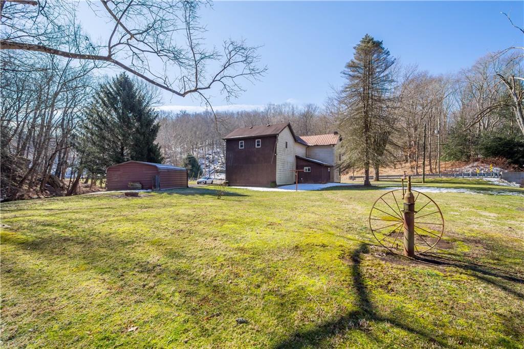 69 Pike Run Road Daisytown, PA 15427 - Photo 8 of 39 a house view with swimming pool in front of the house