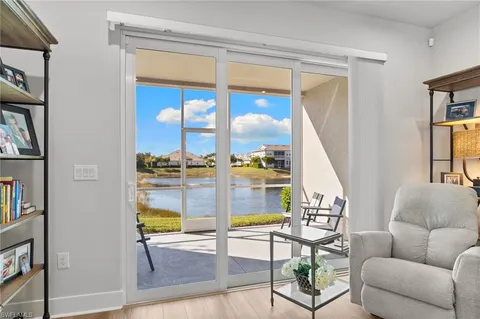 a view of a balcony with lake view and a ocean view
