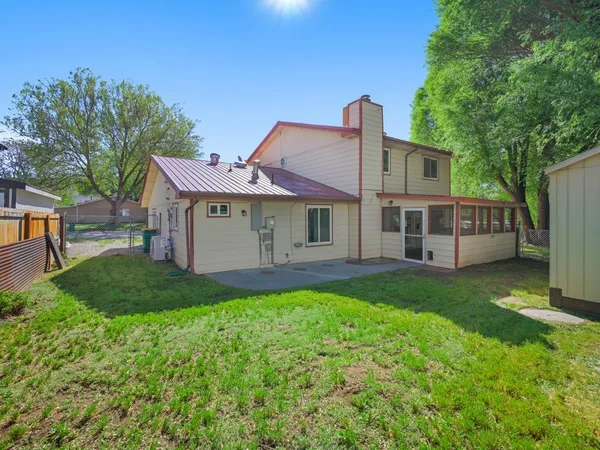 a front view of a house with garage