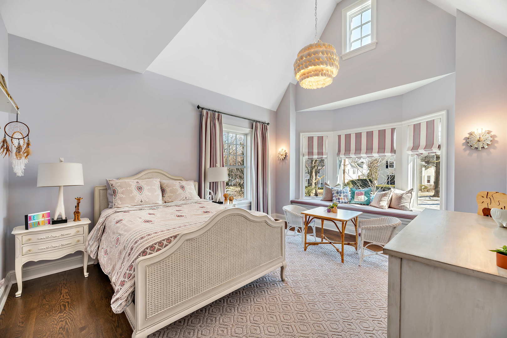 Undisclosed Address Winnetka, IL 60093 - Photo 22 of 41 a room with a bed and a table chair