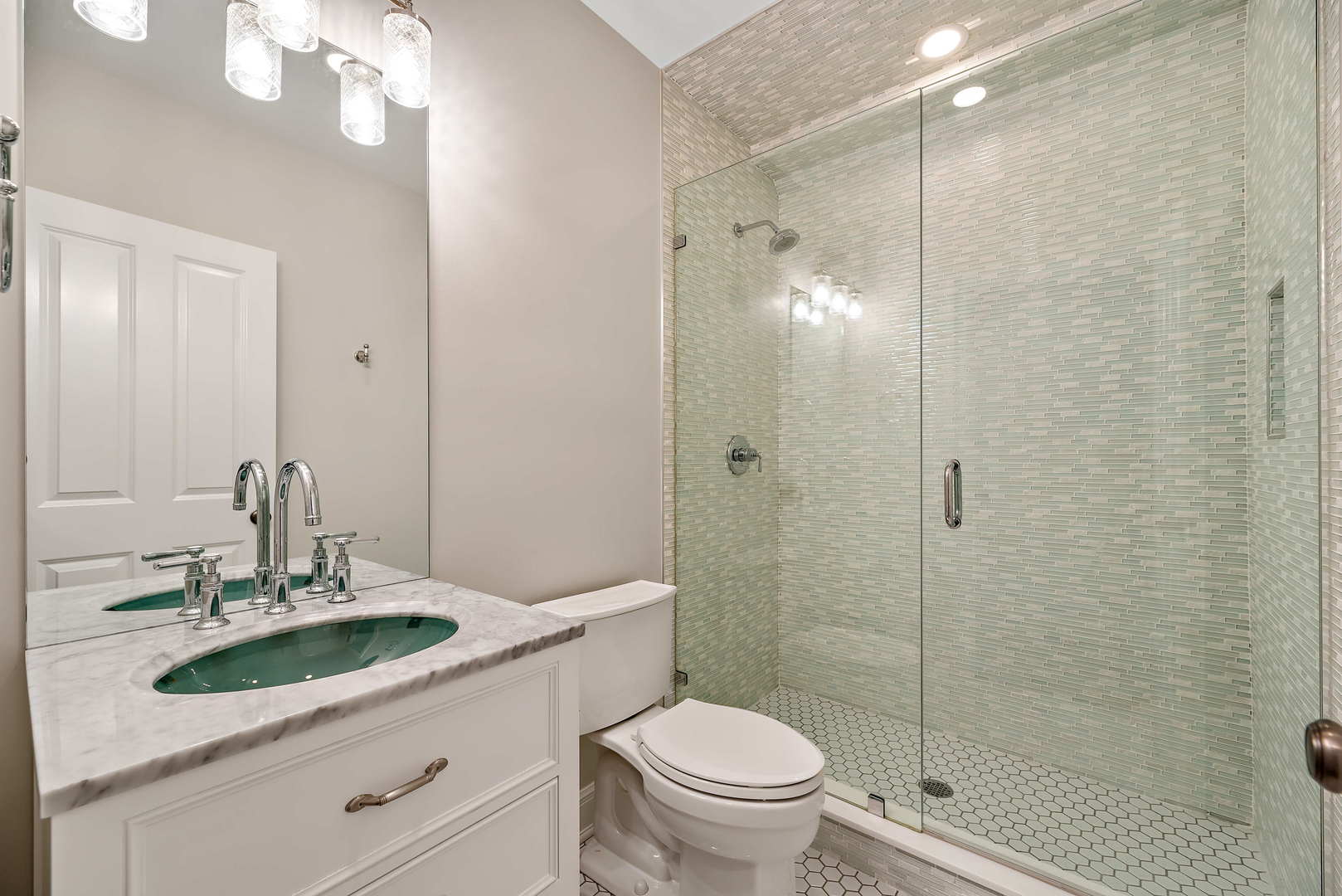 Undisclosed Address Winnetka, IL 60093 - Photo 29 of 41 a bathroom with a sink toilet and shower