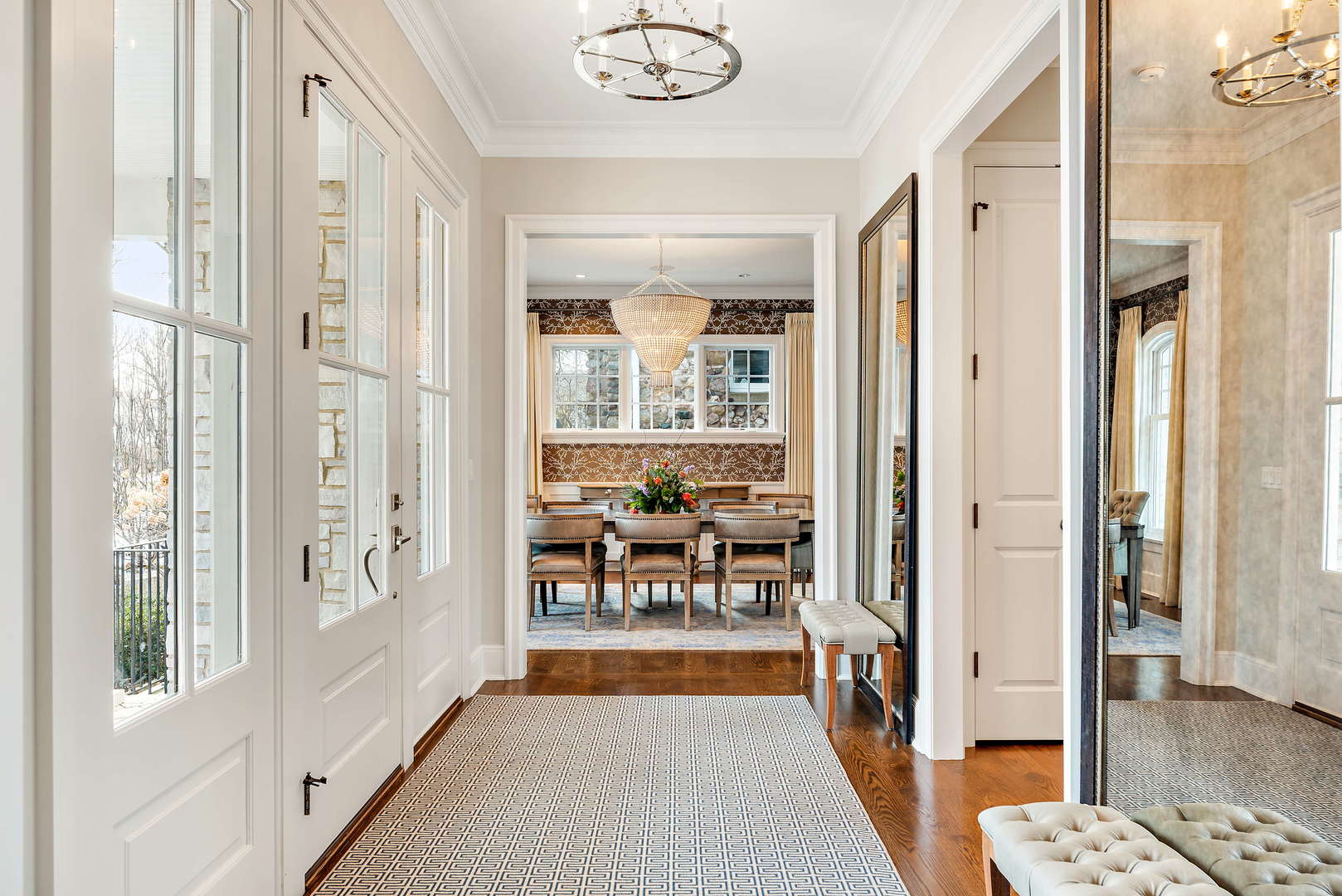 Undisclosed Address Winnetka, IL 60093 - Photo 3 of 41 a hallway with a large window and a rug
