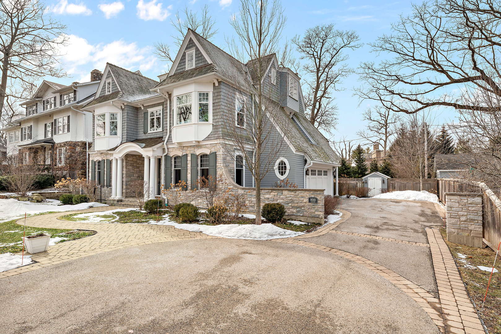 Undisclosed Address Winnetka, IL 60093 - Photo 40 of 41 a view of a house with snow on the road