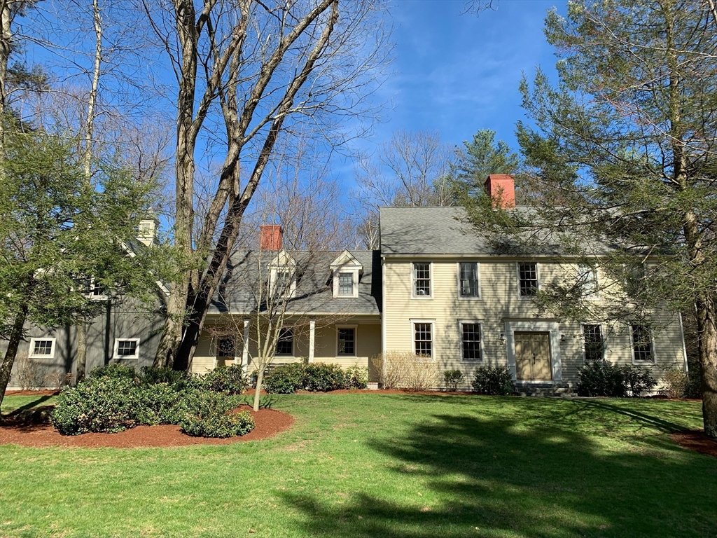 16 Hawthorn Road Amherst, MA 01002 - Photo 1 of 42 a front view of a house with a garden