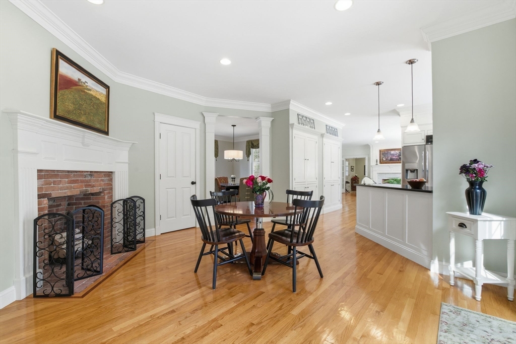 16 Hawthorn Road Amherst, MA 01002 - Photo 13 of 42 a view of a dining room with furniture and wooden floor