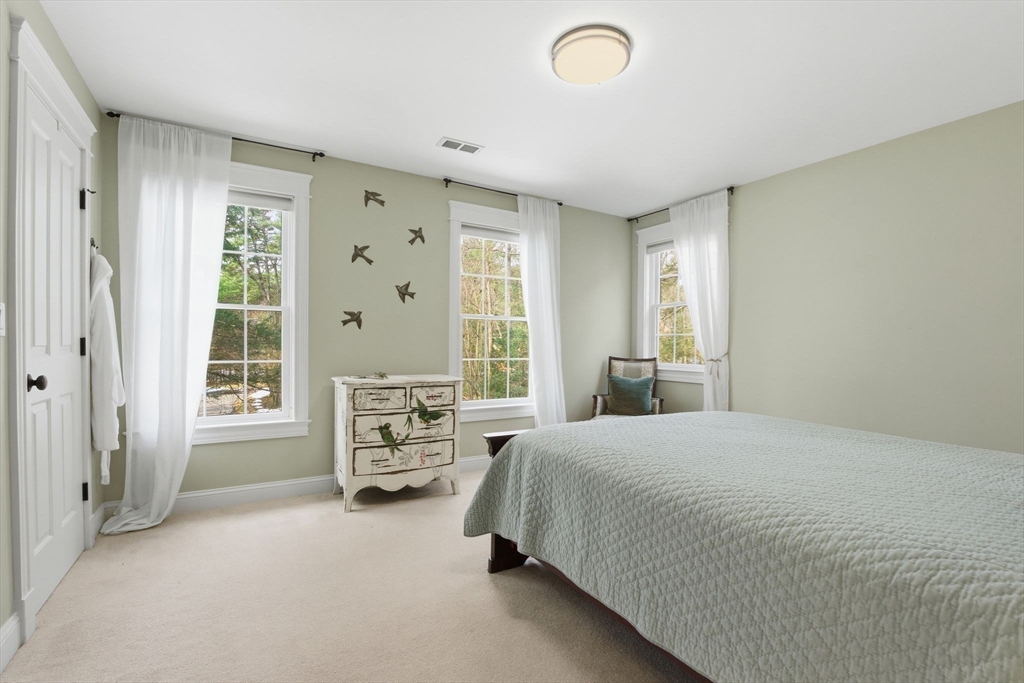 16 Hawthorn Road Amherst, MA 01002 - Photo 26 of 42 a bedroom with a bed and a window