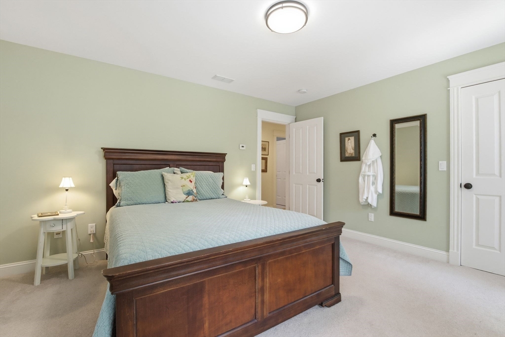 16 Hawthorn Road Amherst, MA 01002 - Photo 27 of 42 a bedroom with a bed and closet