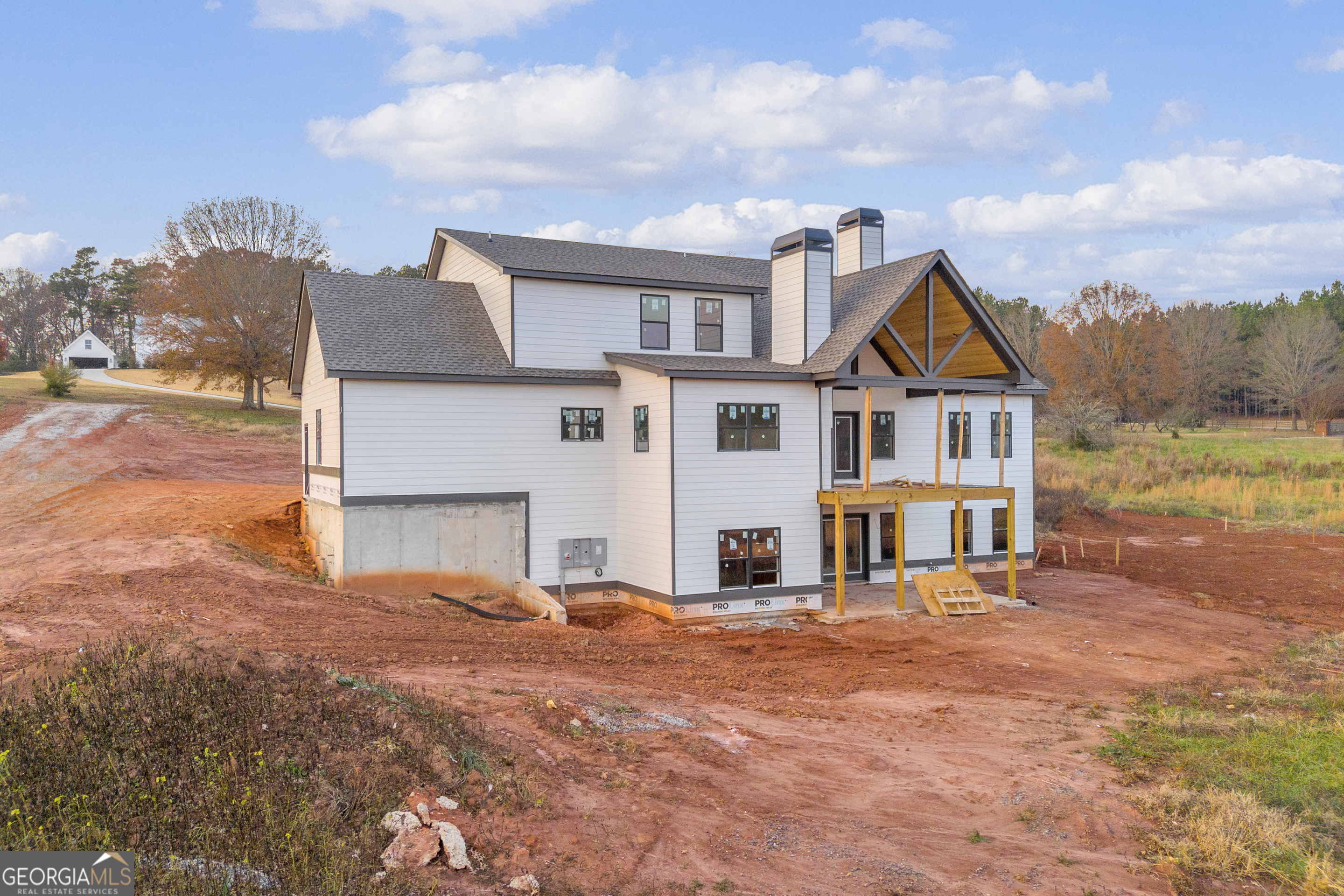 810 North Hampton Way Monroe, GA 30656 - Photo 36 of 50 a view of a house with many windows