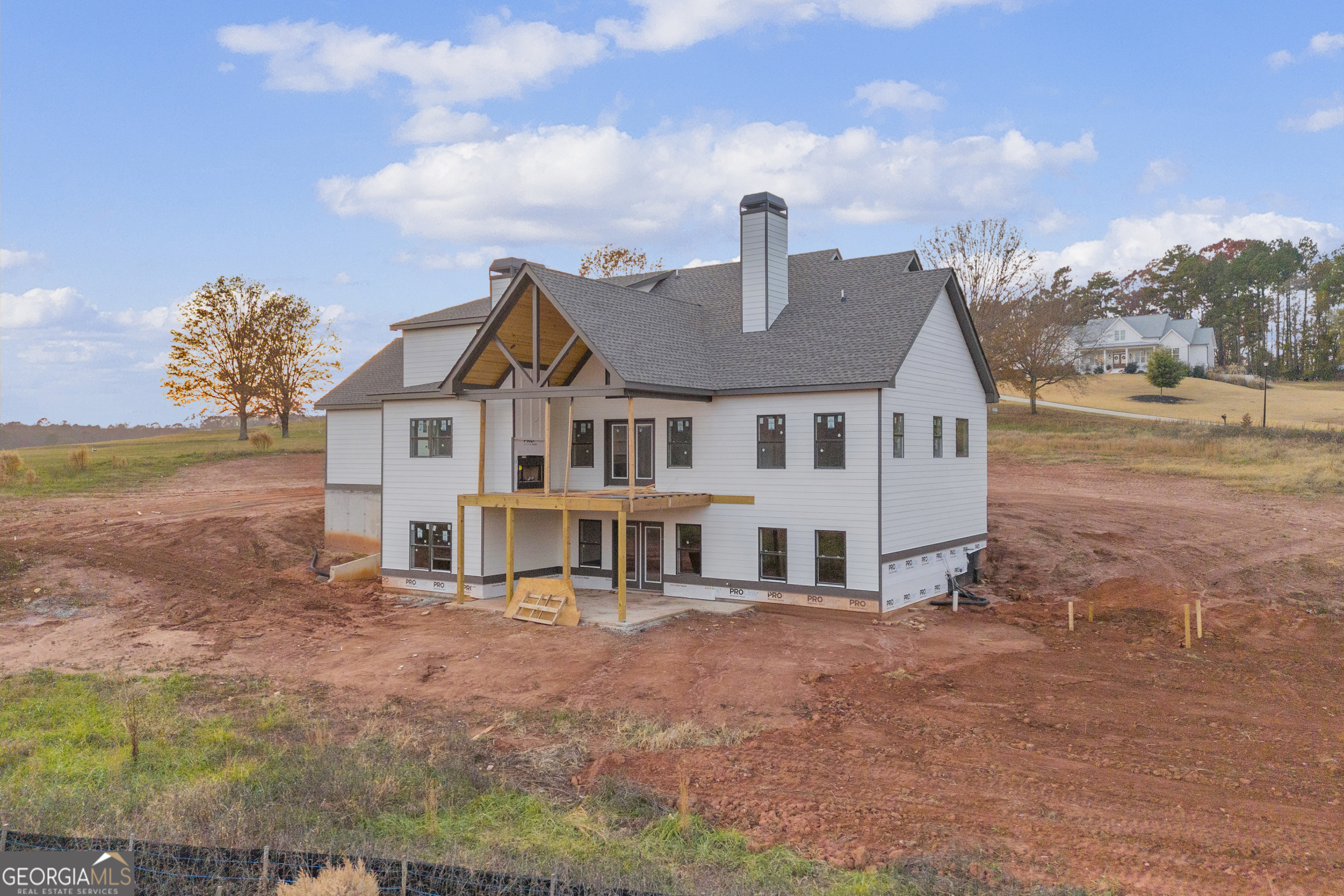 810 North Hampton Way Monroe, GA 30656 - Photo 37 of 50 a front view of a house with a yard