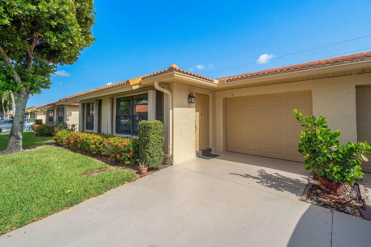 4495 Pandanus Tree Road, Unit A Boynton Beach, FL 33436 - Photo 1 of 32 Front of Home