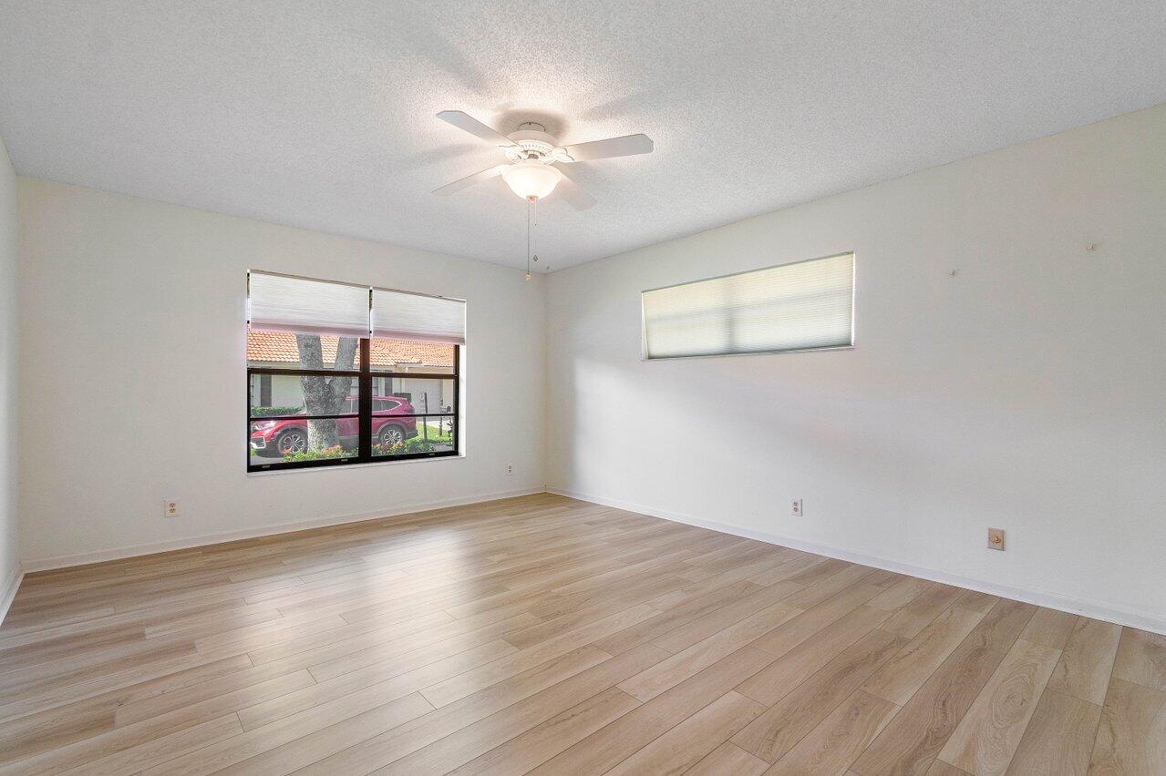 4495 Pandanus Tree Road, Unit A Boynton Beach, FL 33436 - Photo 13 of 32 Master Bedroom