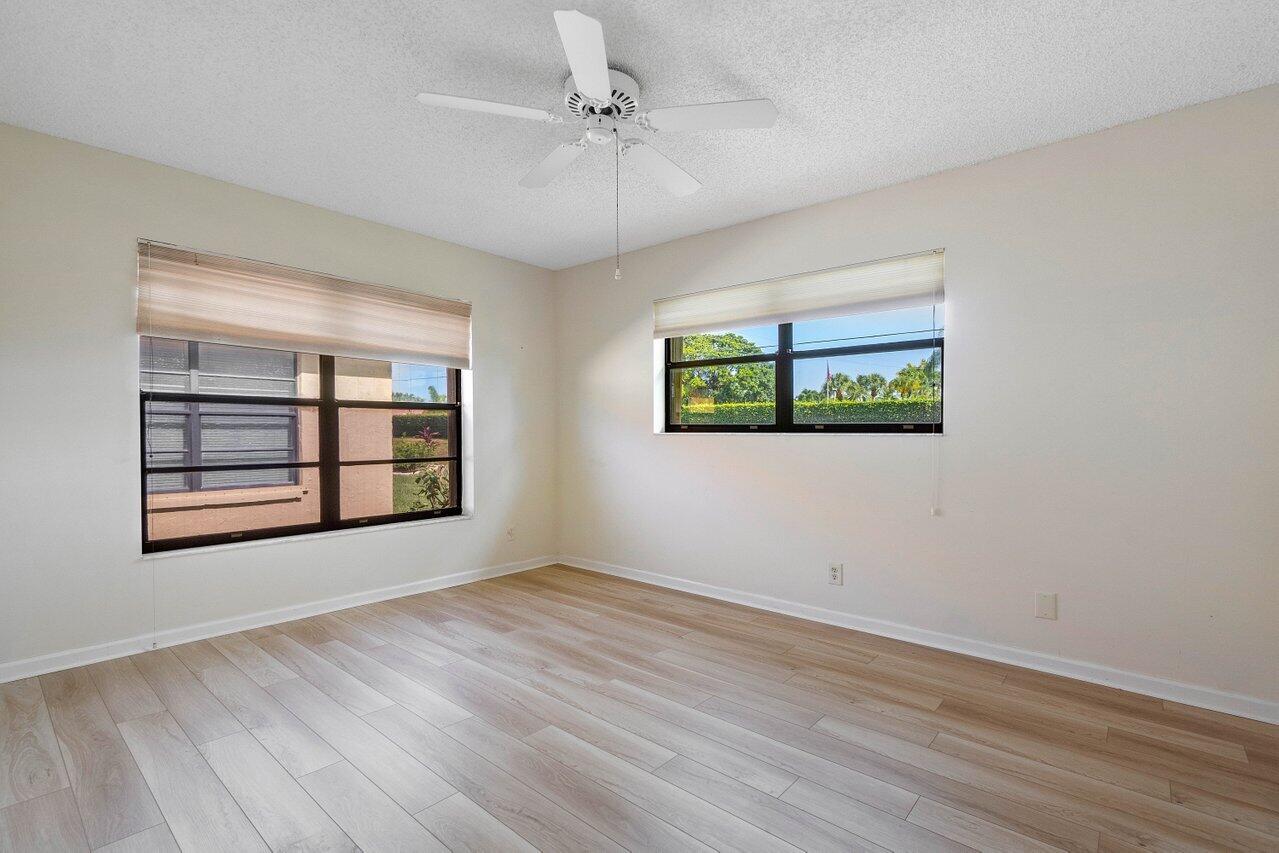 4495 Pandanus Tree Road, Unit A Boynton Beach, FL 33436 - Photo 17 of 32 Guest Bedroom