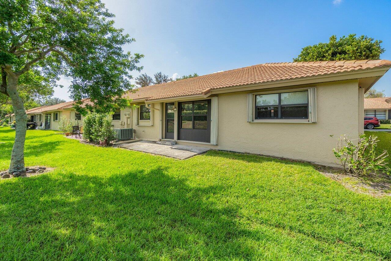 4495 Pandanus Tree Road, Unit A Boynton Beach, FL 33436 - Photo 22 of 32 Back of Villa