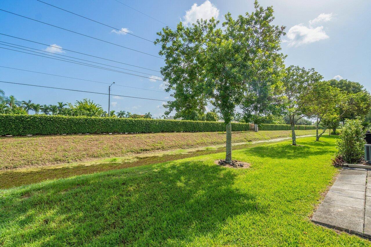 4495 Pandanus Tree Road, Unit A Boynton Beach, FL 33436 - Photo 23 of 32 Back of Villa