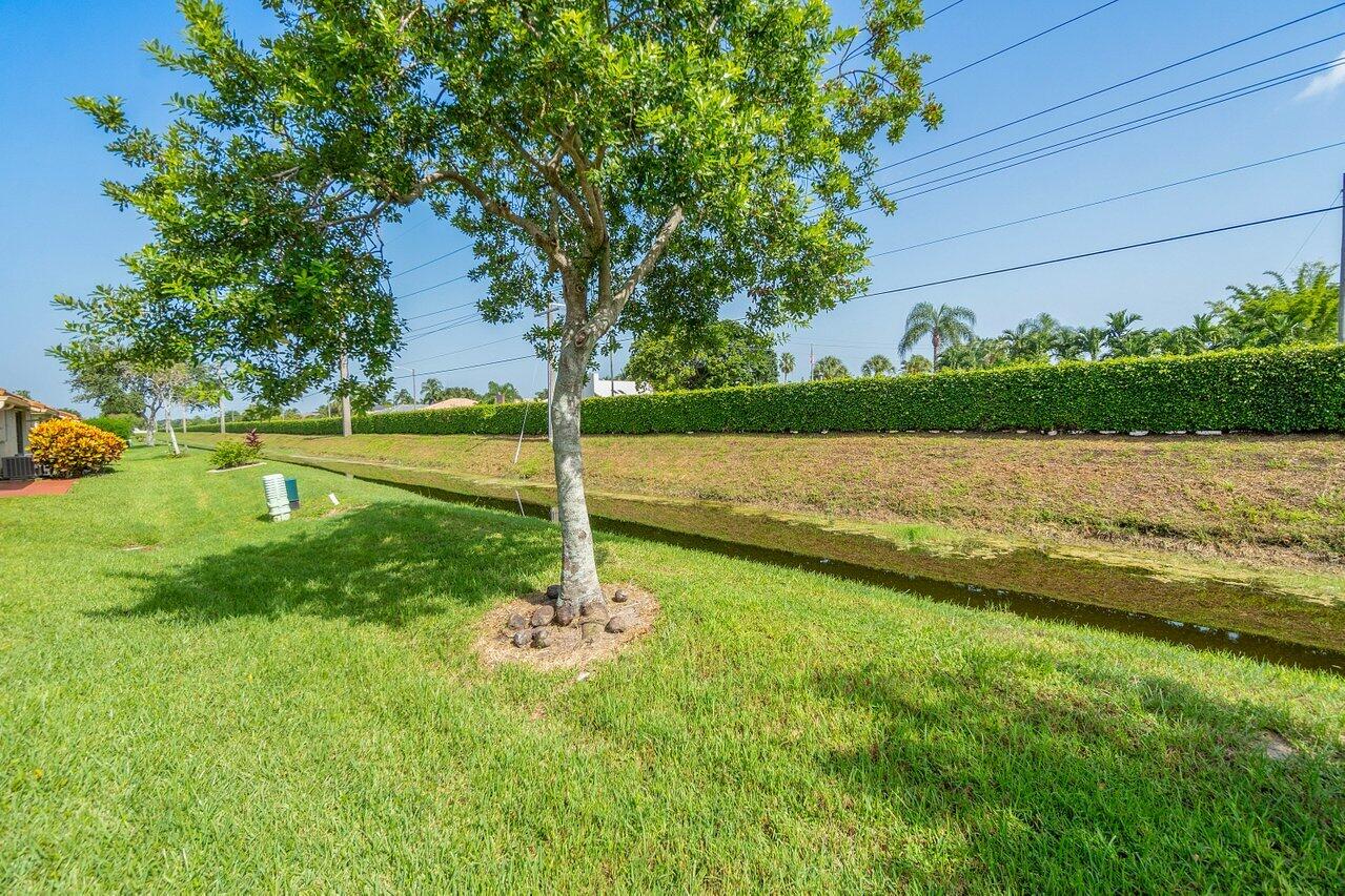 4495 Pandanus Tree Road, Unit A Boynton Beach, FL 33436 - Photo 24 of 32 Back of Villa