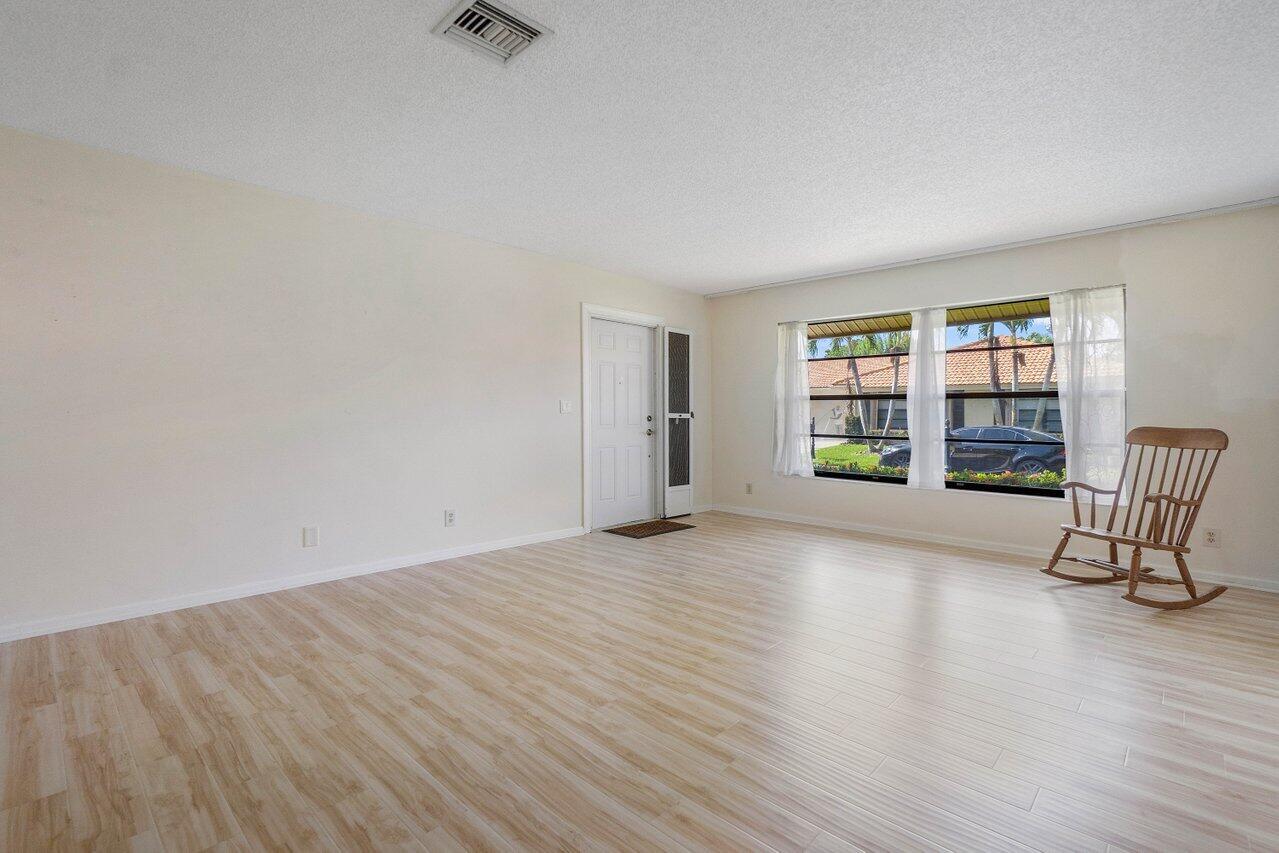 4495 Pandanus Tree Road, Unit A Boynton Beach, FL 33436 - Photo 3 of 32 Living Room