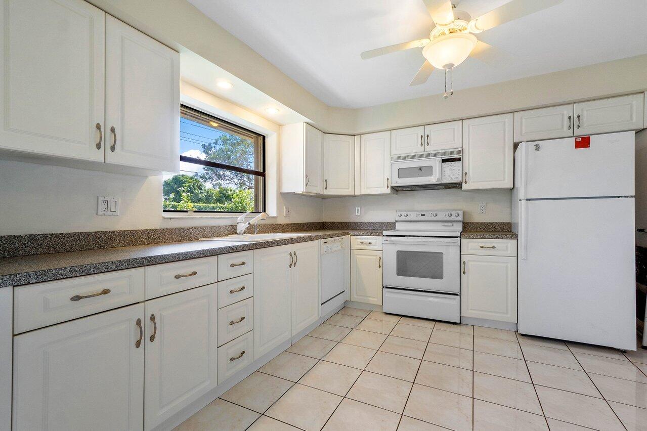 4495 Pandanus Tree Road, Unit A Boynton Beach, FL 33436 - Photo 9 of 32 Kitchen