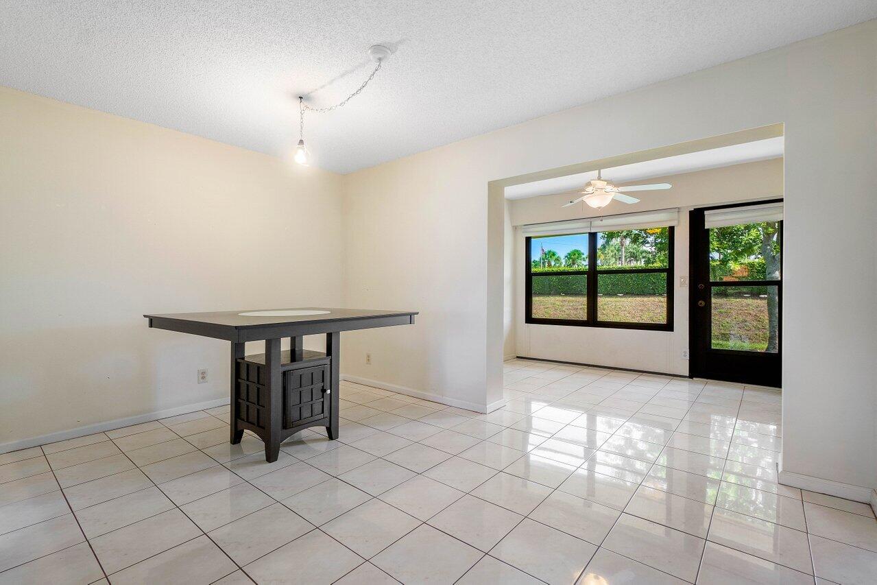 4495 Pandanus Tree Road, Unit A Boynton Beach, FL 33436 - Photo 10 of 32 Dining Room