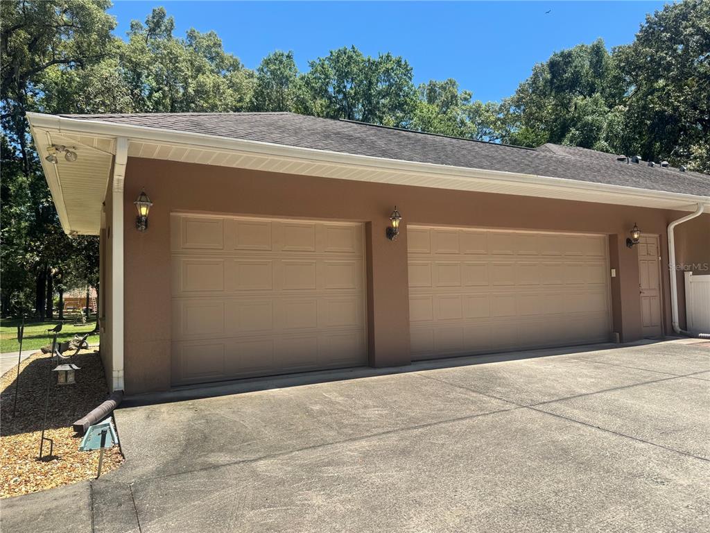 11145 Northwest 17th Court Road Ocala, FL 34475 - Photo 17 of 59 a front view of a house with trees
