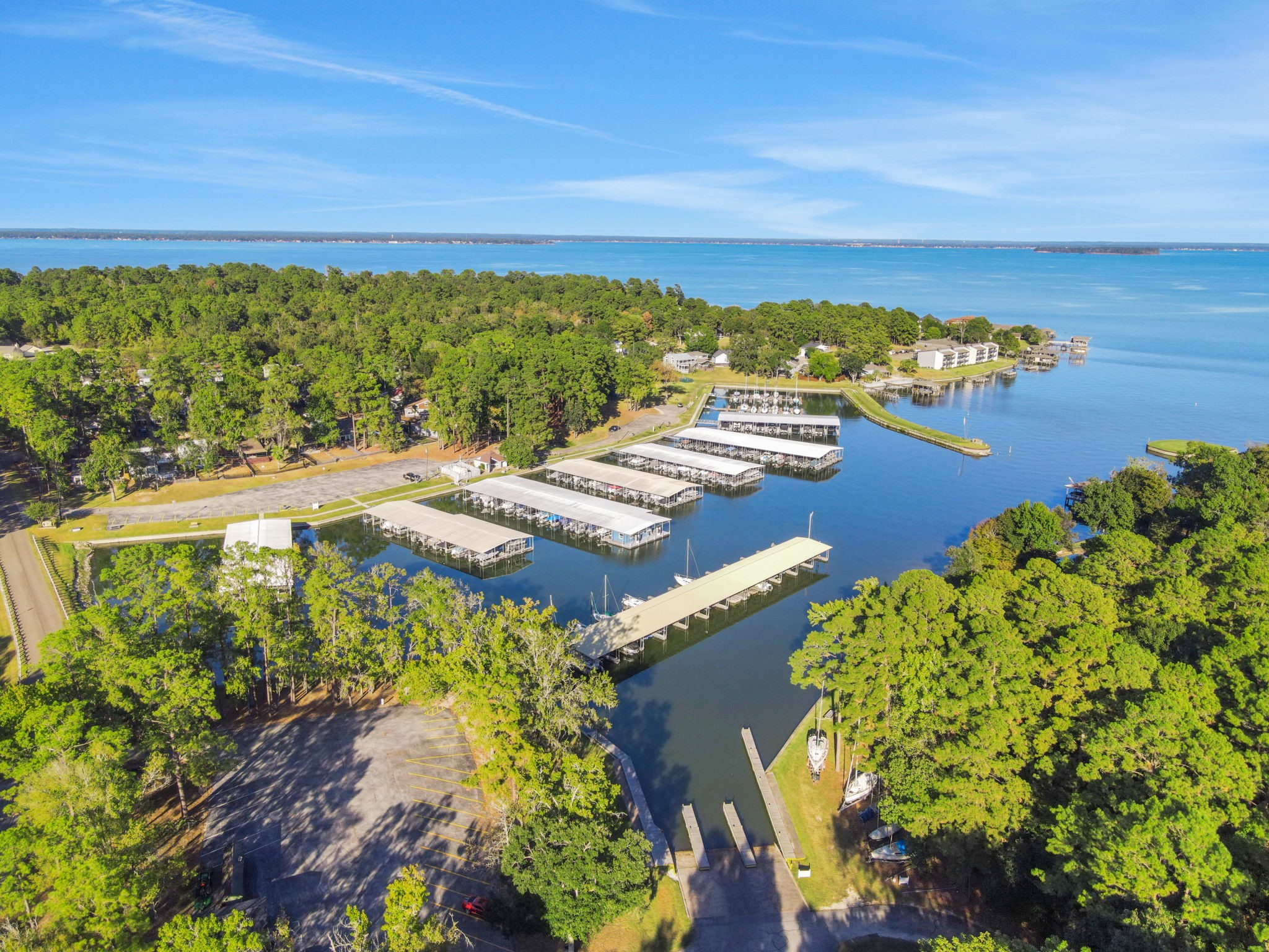 90 Harbour Lane Coldspring, TX 77331 - Photo 27 of 40 Cape Royale marina on Lake Livingston offering boat slips and easy lake access for residents.