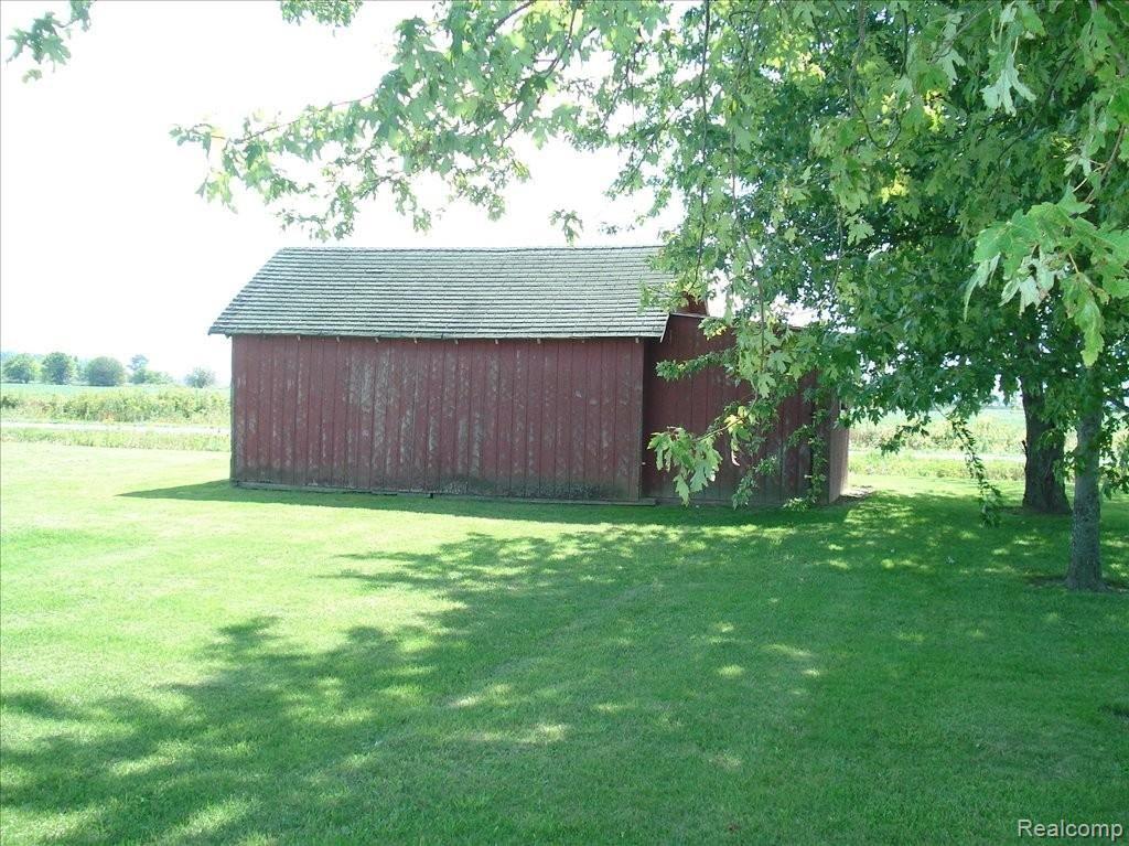 7023 Lenawee County Line Road Britton, MI 49229 - Photo 12 of 25 SHED ON BACK OF PROPERTY