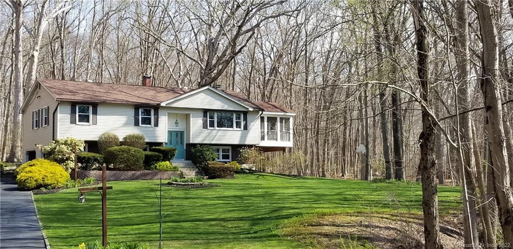 173 Old Willimantic Road Columbia, CT 06237 - Photo 1 of 1 Front view awnings up