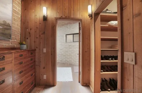 a bed room with a bed and a window