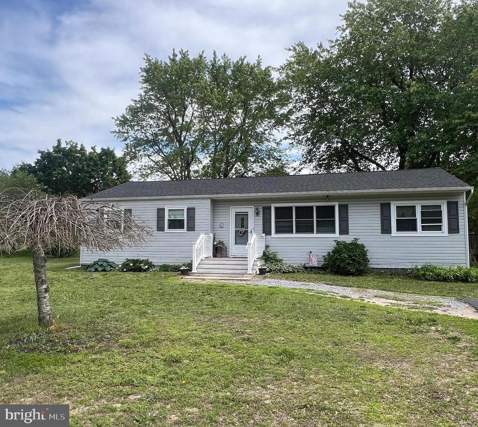 707 Upper Neck Road Pittsgrove, NJ 08318 - Photo 1 of 14 a front view of house with yard outdoor seating and green space