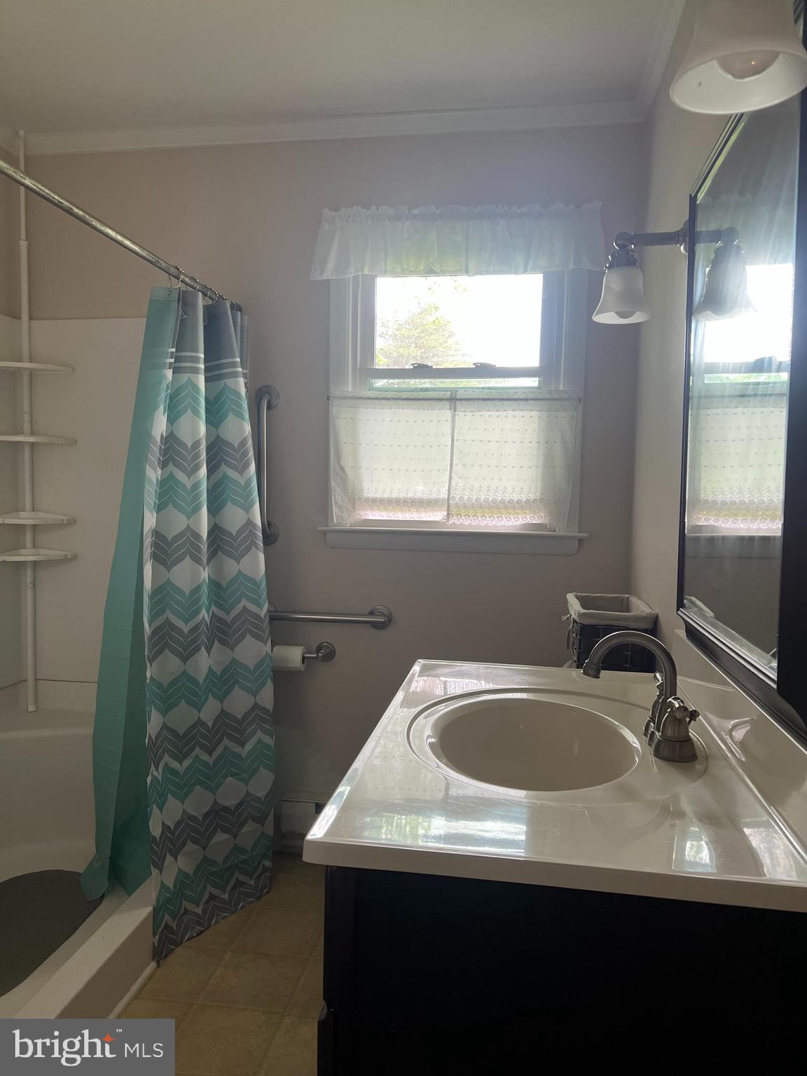 707 Upper Neck Road Pittsgrove, NJ 08318 - Photo 6 of 14 a bathroom with a granite countertop sink a toilet a mirror and shower