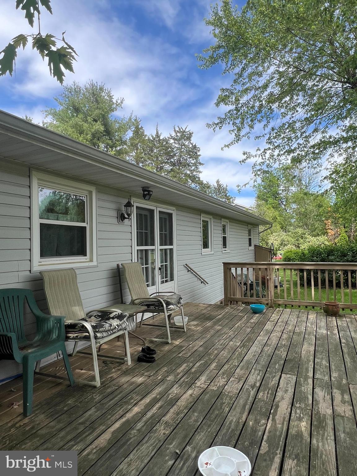 707 Upper Neck Road Pittsgrove, NJ 08318 - Photo 9 of 14 a view of a chairs and table on the wooden deck