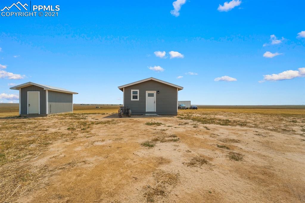 1331 County Road R Rush, CO 80833 - Photo 1 of 22 a view of a house with a dry yard