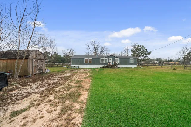 a view of yard with tree s