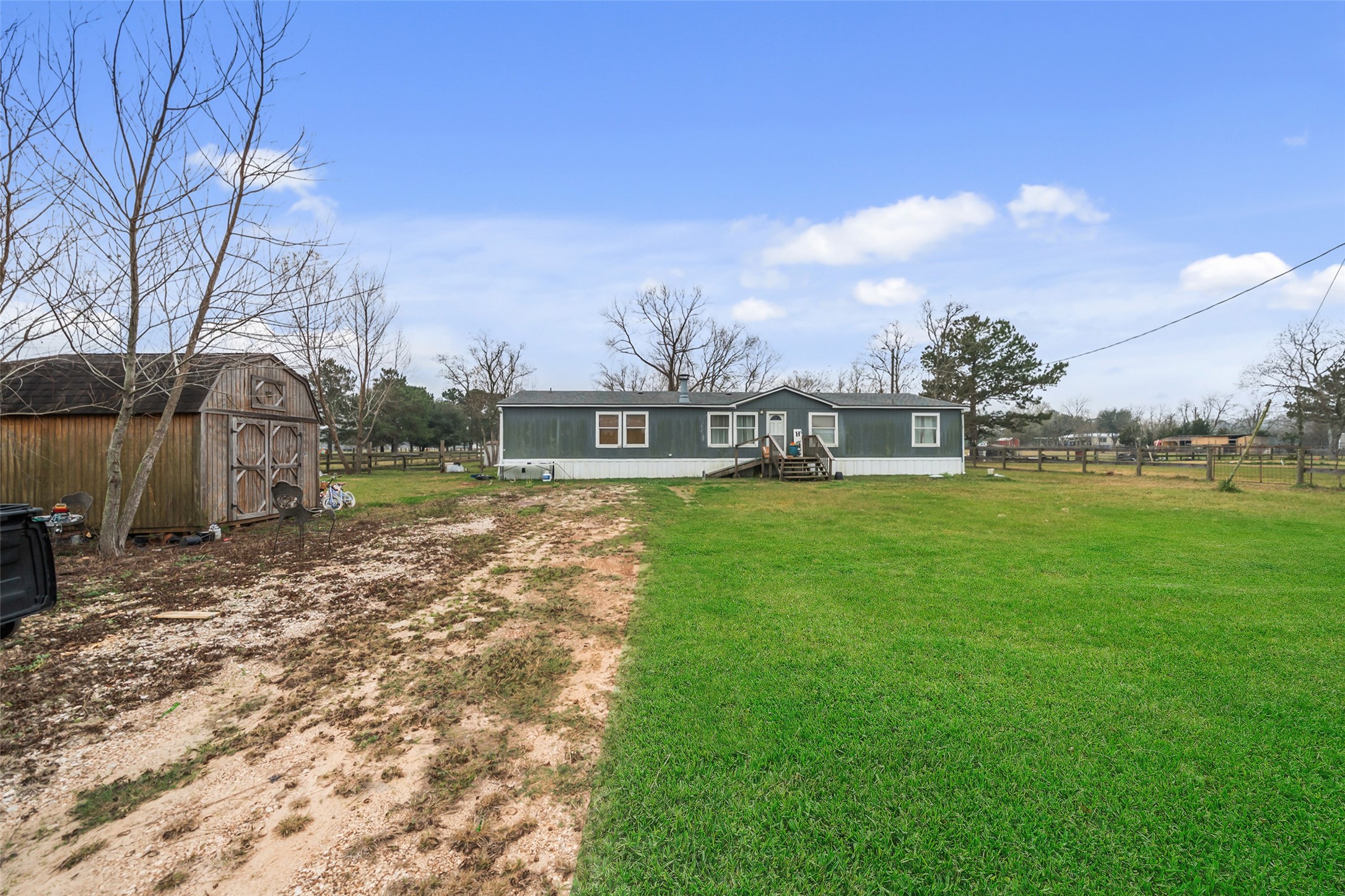 234 County Road 2286 Cleveland, TX 77327 - Photo 1 of 35 *Grass has been virtually enhanced.*