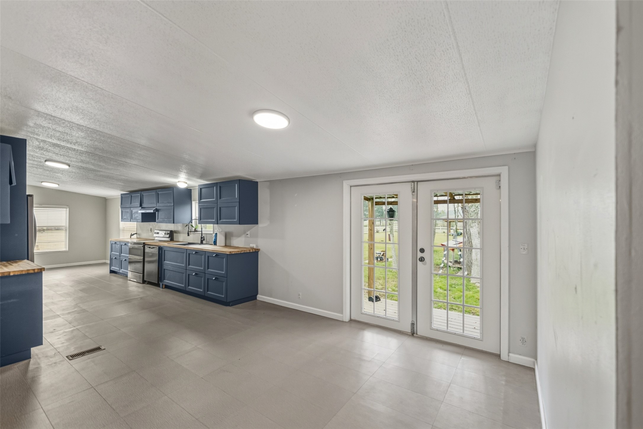 234 County Road 2286 Cleveland, TX 77327 - Photo 17 of 35 Another look at the kitchen/dining/breakfast.