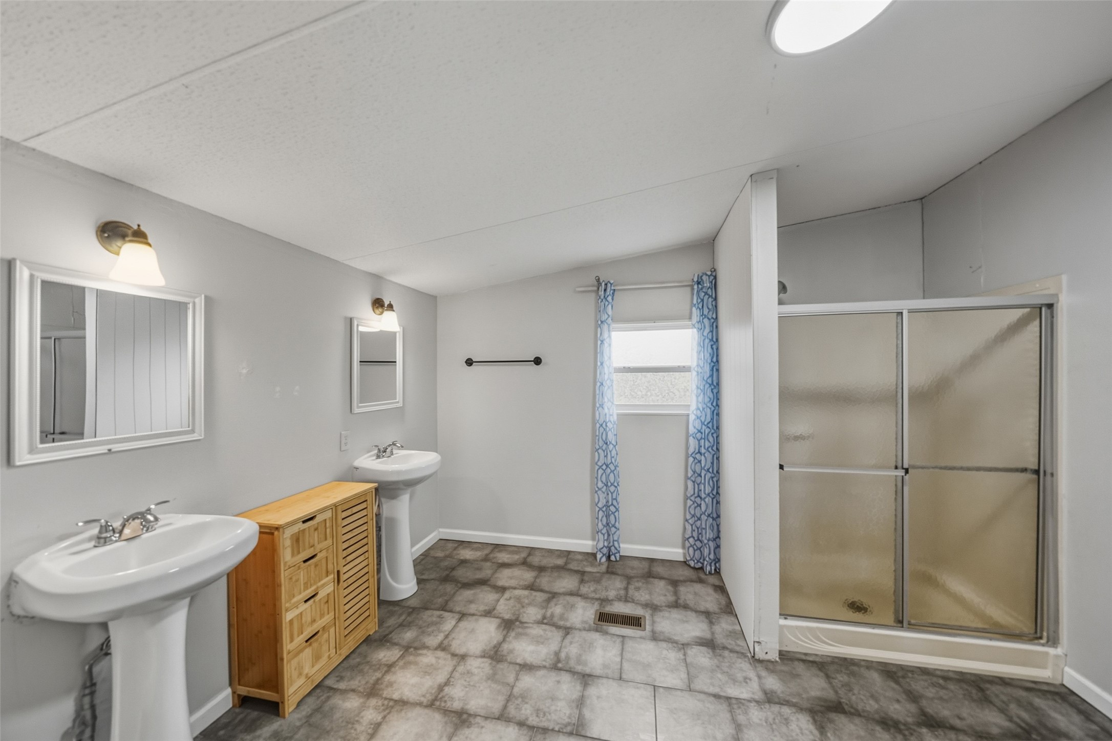 234 County Road 2286 Cleveland, TX 77327 - Photo 20 of 35 Primary bath with walk-in shower.