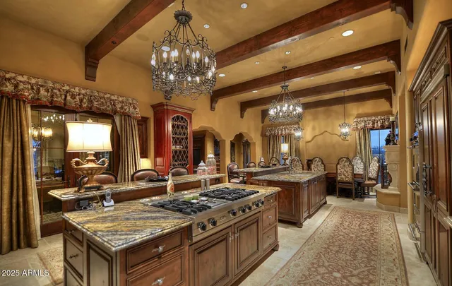 a kitchen with stove and refrigerator