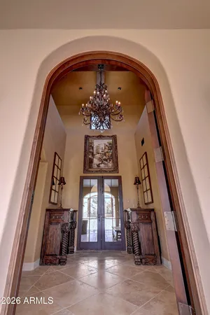 a view of hall way with furniture and staircase