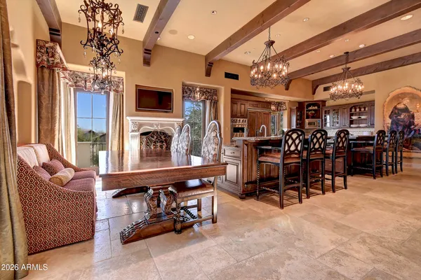 a kitchen with stainless steel appliances a sink and cabinets